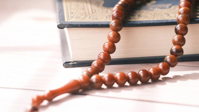 Dua when placing the Deceased in the Grave